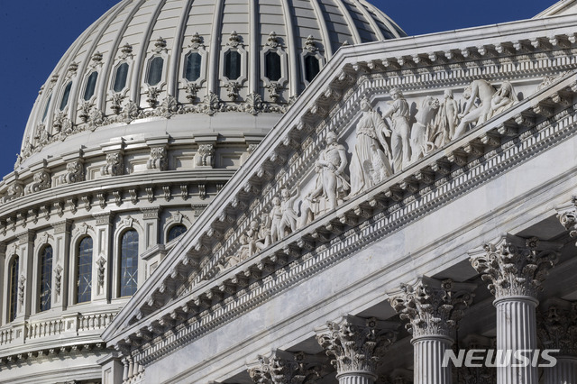 FILE - In this May 25, 2019, file photo the U.S. Senate and Capitol dome are seen on Capitol Hill in Washington. On Wednesday, June 12, the Treasury Department releases federal budget data for May. (AP Photo/Alex Brandon, File)