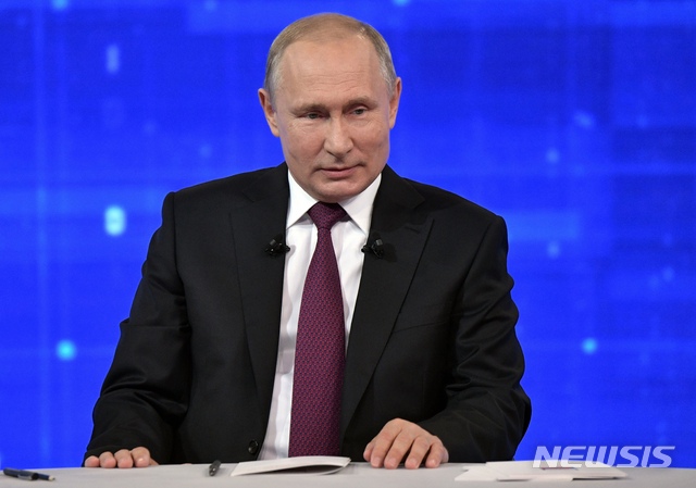 Russian President Vladimir Putin speaks during his annual call-in show in Moscow, Russia, Thursday, June 20, 2019. Putin hosts call-in shows every year, which typically provide a platform for ordinary Russians to appeal to the president on issues ranging from foreign policy to housing and utilities. (Alexei Nikolsky, Sputnik, Kremlin Pool Photo via AP)