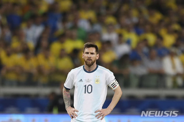 Argentina's Lionel Messi stands in the field during a Copa America semifinal soccer match against Brazil at the Mineirao stadium in Belo Horizonte, Brazil, Tuesday, July 2, 2019. (AP Photo/Ricardo Mazalan)