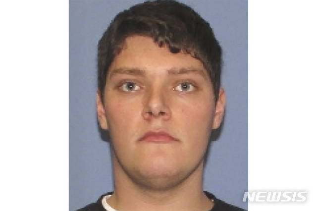 This undated photo provided by the Dayton Police Department shows Connor Betts. The 24-year-old masked gunman in body armor opened fire early Sunday, Aug. 4, 2019, in a popular entertainment district in Dayton, Ohio, killing several people, including his sister, and wounding dozens before he was quickly slain by police, officials said. (Dayton Police Department via AP)