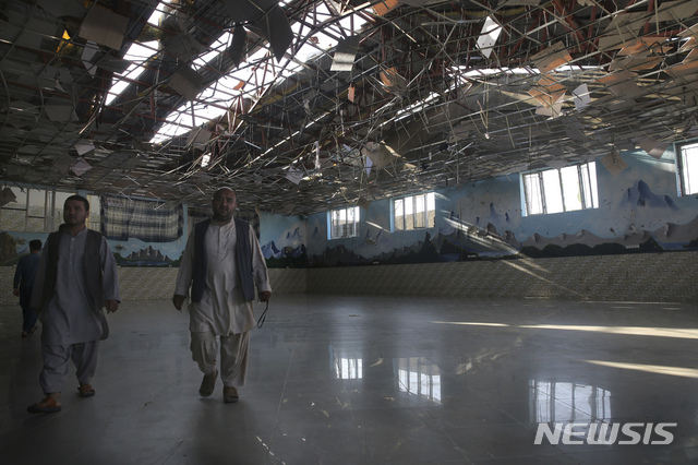 The damage of Dubai City wedding hall is seen after an explosion in Kabul, Afghanistan, Sunday, Aug.18, 2019. A suicide-bomb blast ripped through a wedding party on a busy Saturday night. (AP Photo/Rafiq Maqbool)