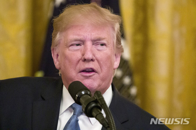 FILE - This July 8, 2019, file photo shows President Donald Trump speaking during an event about the environment in the East Room of the White House, in Washington. President Donald Trump hasn’t given up his fight to block critics from his Twitter feed. Justice Department lawyers Friday, Aug. 23, 2019 asked the full 2nd U.S. Circuit Court of Appeals in Manhattan to decide whether a three-judge appeals panel erred in ruling he could not. The lawyers say the July ruling conflicts with prior court precedents and presents a question of “exceptional importance.” (AP Photo/Alex Brandon, File)