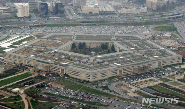 FILE - This March 27, 2008, aerial file photo, shows the Pentagon in Washington. Amazon is protesting the Pentagon’s decision to award a huge cloud-computing contract to Microsoft, citing “unmistakable bias” in the decision. Amazon’s competitive bid for the “war cloud” drew criticism from President Donald Trump and its business rivals. ((AP Photo/Charles Dharapak, File)