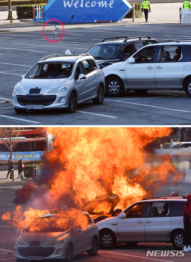 [부산=뉴시스] 하경민 기자 = 2019 한·아세안 특별정상회의 국가 대테러종합훈련이 열린 21일 오후 부산 해운대구 벡스코 야외주차장에서 드론을 이용한 테러 시범이 펼쳐지고 있다. 이날 훈련은 한·아세안 특별정상회의 개최를 앞두고 동시다발 테러상황에 대비하기 위한 것으로, 9개 기관에서 500여 명이 참가했다. 2019.11.21.yulnetphoto@newsis.com