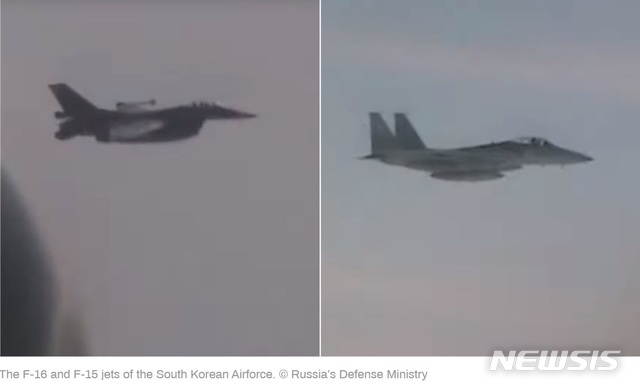 [서울=뉴시스] 러시아 국방부가 자국 투폴례프(Tu)-95MS 전략 폭격기의 27일(현지시간) 동해상 훈련 비행 모습을 영상으로 공개했다. 러시아 국방부는 위 사진 속 전투기들이 훈련 당시 따라붙은 한국 공군의 F-16, F-15 전투기라고 주장했다. <출처: 러시아투데이> 2019.11.29.