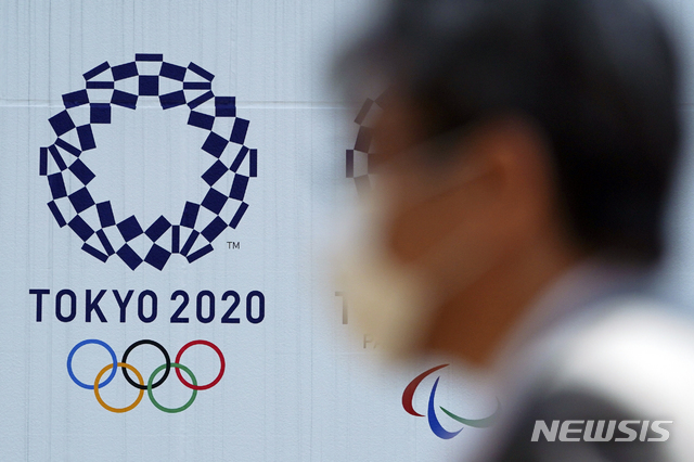 [도쿄=AP/뉴시스] 영국 보건전문가는 코로나19 백신이 나와야 내년 도쿄올림픽 개최가 가능하다고 밝혔다. 2020.04.02.