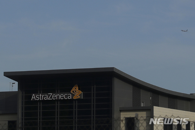 FILE - In this Thursday, Feb. 20, 2020 file photo, a view of the AstraZeneca logo, on a building, in South San Francisco, Calif. Drug maker AstraZeneca secured its first agreements Thursday, May 21, 2020 for 400 million doses of a COVID-19 vaccine, bolstered by an investment from the U.S. vaccine agency. (AP Photo/Jeff Chiu, File)