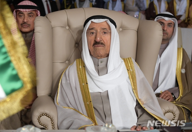 FILE - In this March 31, 2019 file photo, Kuwait&#039;s ruling emir, Sheikh Sabah Al Ahmad Al Sabah, attends the opening of the 30th Arab Summit, in Tunis, Tunisia. Kuwait state television said Tuesday, Sept. 29, 2020, the country&#039;s 91-year-old ruler, Sheikh Sabah Al Ahmad Al Sabah, had died. (Fethi Belaid/Pool Photo via AP, File)