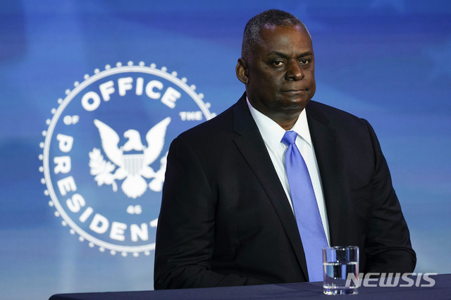 Retired Army Gen. Lloyd Austin, the Biden administrations choice to be secretary of defense, listens during an event at The Queen theater in Wilmington, Del., Wednesday, Dec. 9, 2020. (AP Photo/Susan Walsh)