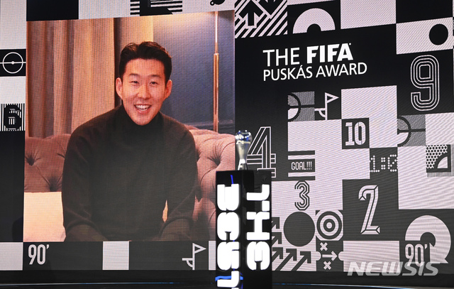 South Korea&#039;s Son Heung-min smiles as he is interviewed after he won the Puskas award at the Best FIFA Football Awards Ceremony in Zurich, Switzerland, Thursday, Dec. 17, 2020. (Valeriano Di Domenico/Pool via AP)