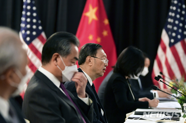 Chinese Communist Party foreign affairs chief Yang Jiechi, center, and China&#039;s State Councilor Wang Yi, second from left, speak at the opening session of US-China talks at the Captain Cook Hotel in Anchorage, Alaska, Thursday, March 18, 2021. (Frederic J. Brown/Pool via AP)