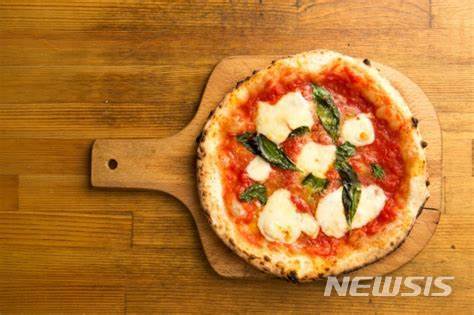 [장수브랜드 탄생비화]국내 첫 프랜차이즈 피자 브랜드 '피자헛'