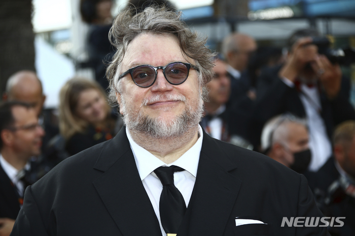 Guillermo del Toro poses for photographers upon arrival at the 75th anniversary celebration of the Cannes film festival and the premiere of the film 'The Innocent' at the 75th international film festival, Cannes, southern France, Tuesday, May 24, 2022. (Photo by Joel C Ryan/Invision/AP)