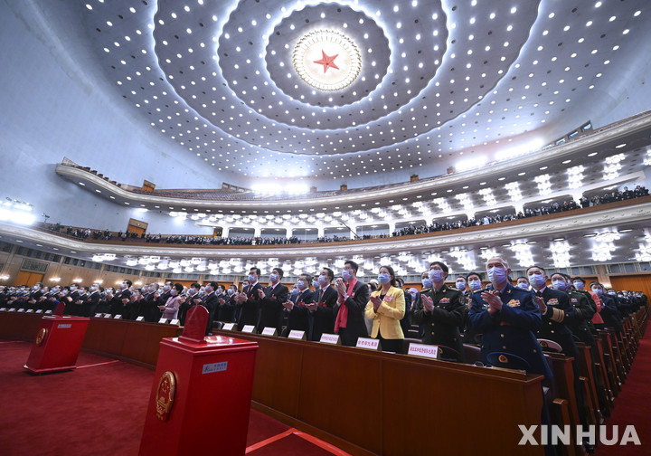 [베이징=신화/뉴시스] 10일 베이징 인민대회당에서 열린 전국인민대표대회(전인대) 14기 1차 회의 제3차 전체회의가 진행되고 있다. 2023.03.10.