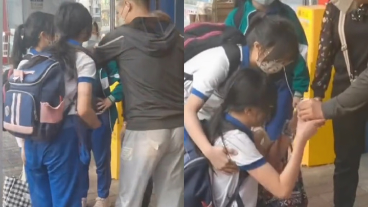 [서울=뉴시스]중국 광동성 광저우의 한 거리에서 교복을 입은 소녀가 한 여성에게 떨어뜨린 돈을 달라며 무릎을 꿇고 비는 사건이 발생했다. 해당 영상은 중국 소셜미디어를 통해 급속도로 퍼지며 여성에 대한 비난의 목소리가 커지고 있다. (사진출처 : 미국 넥스트샤크 갈무리)2023.03.21 *재판매 및 DB 금지
