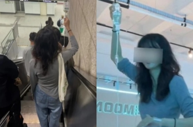 [서울=뉴시스] 중국 상하이의 한 지하철역에서 한 여성이 팔에 링거를 꽂은 채 퇴근하는 모습 (사진=더우인 갈무리 ) 2023.06.07. *재판매 및 DB 금지