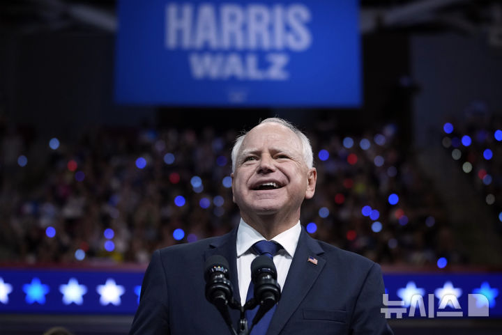 Democratic vice presidential nominee Minnesota Gov. Tim Walz appears with Democratic presidential nominee Vice President Kamala Harris at a campaign rally in Philadelphia, Tuesday, Aug. 6, 2024. (AP Photo/Matt Rourke)