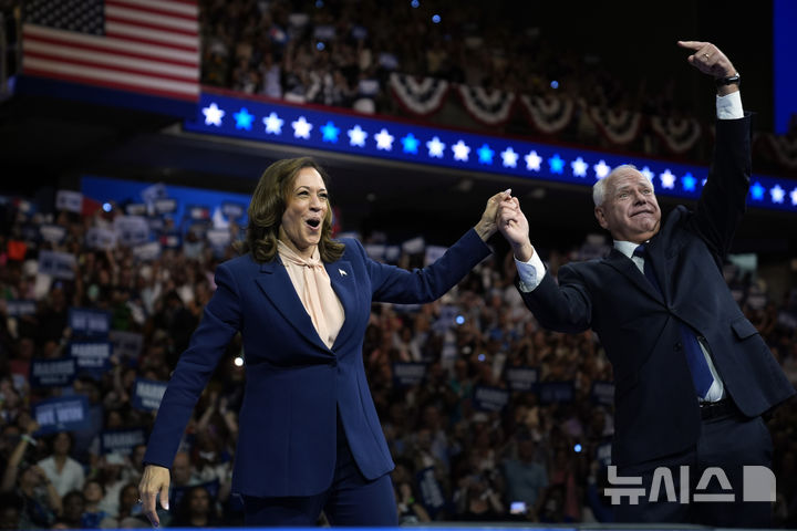 Democratic presidential nominee Vice President Kamala Harris and her running mate Minnesota Gov. Tim Walz speak at a campaign rally in Philadelphia, Tuesday, Aug. 6, 2024. (AP Photo/Matt Rourke)