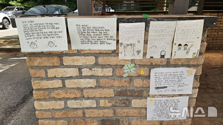 흔적 지워진 아파트 사고 도로…남은 건 아이들 기도