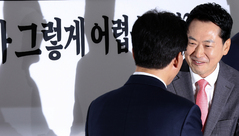 악수하는 김민석-장동혁